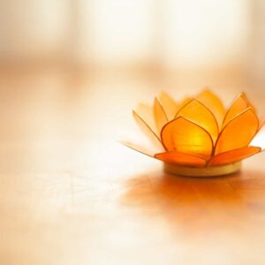 Lotus flower candle image to illustrate page about intuition foundation development