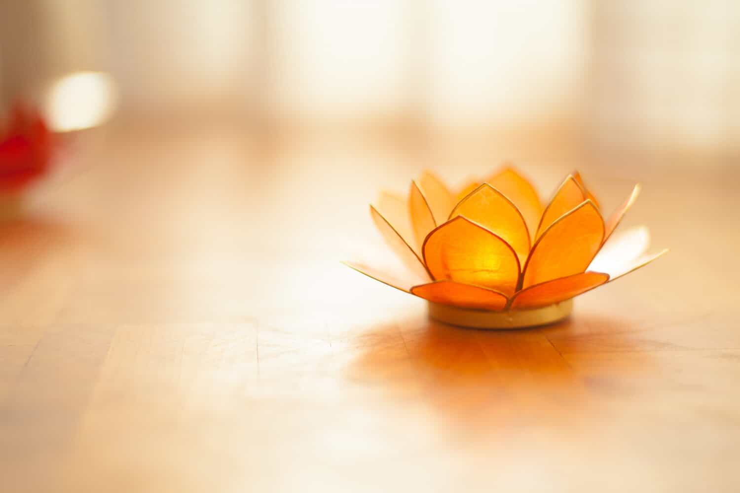 Lotus flower candle image to illustrate page about intuition foundation development